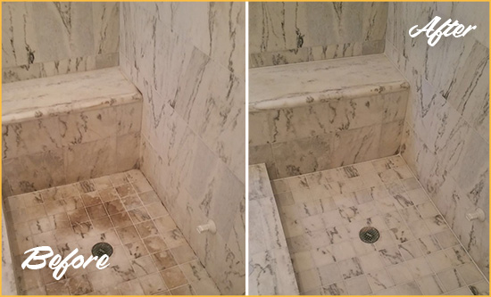 Before and After Picture of a Dirty Colonial Heights Marble Shower Cleaned to Eliminate Dark Stains